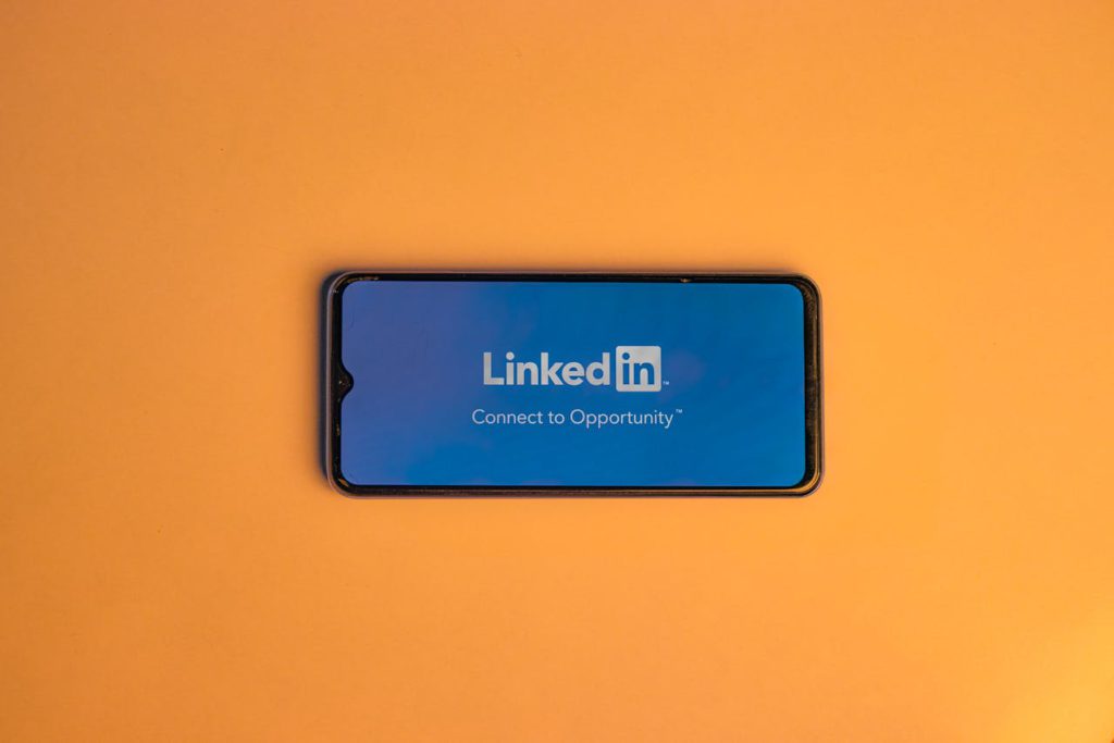 a phone with a linkedin logo on its display