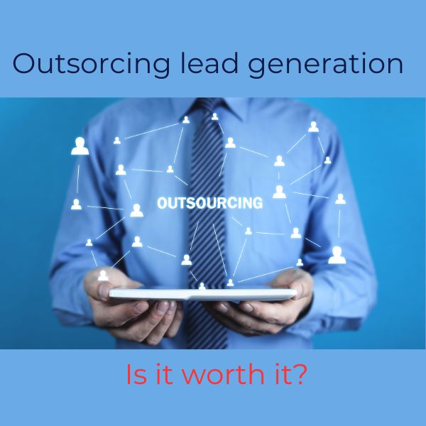 Businessman holding tablet with network graphic and the word outsourcing, representing outsourced lead generation.